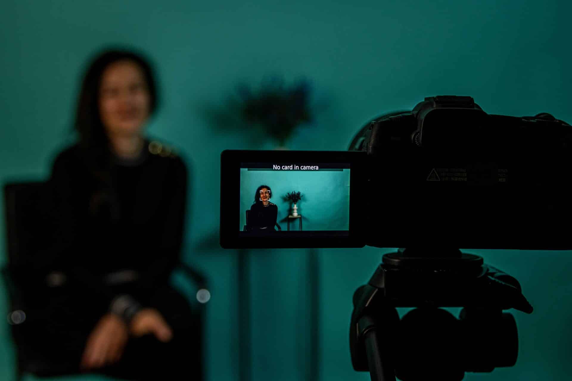Filming woman