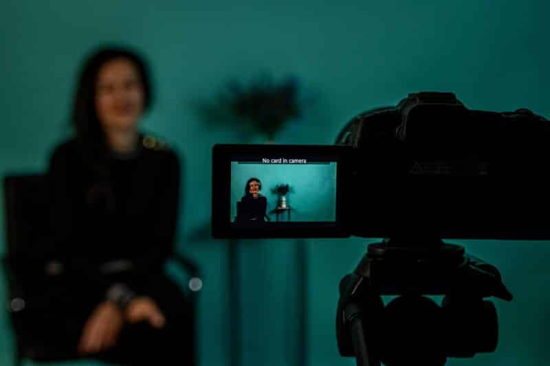 Filming woman