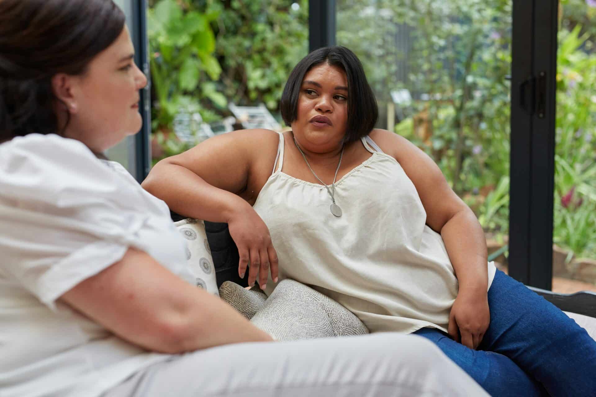 Women chatting inside